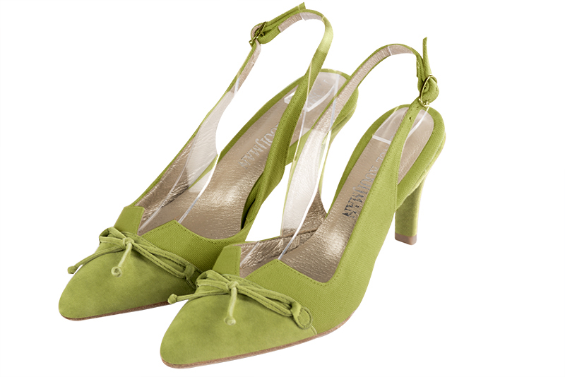 Pistachio green women's open back shoes, with a knot. Tapered toe. Medium slim heel. Front view - Florence KOOIJMAN